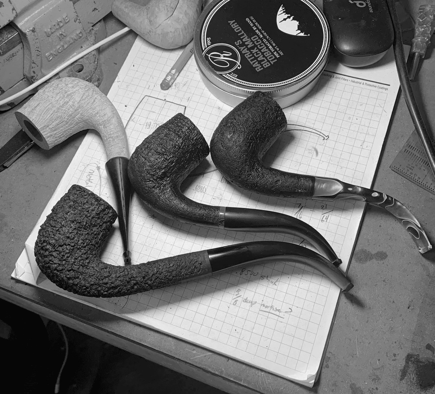 Rose Pipes signature Swan shape — three finished Swans on blueprint paper